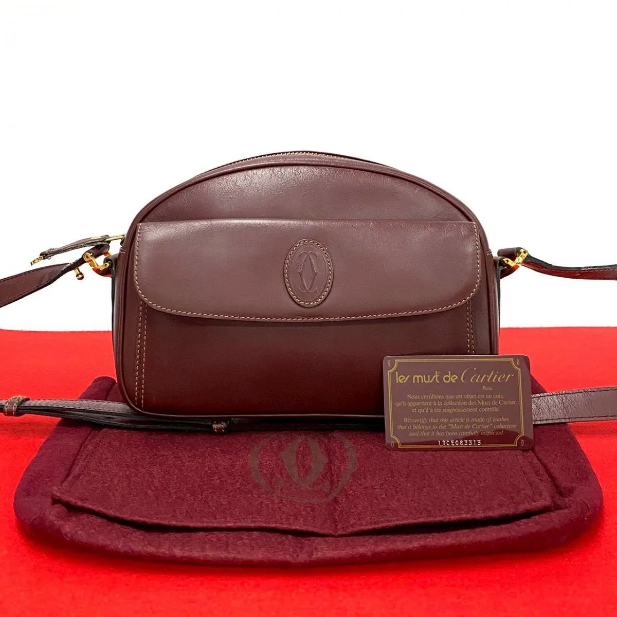 CARTIER Shoulder Bag leather wine-red Must Line