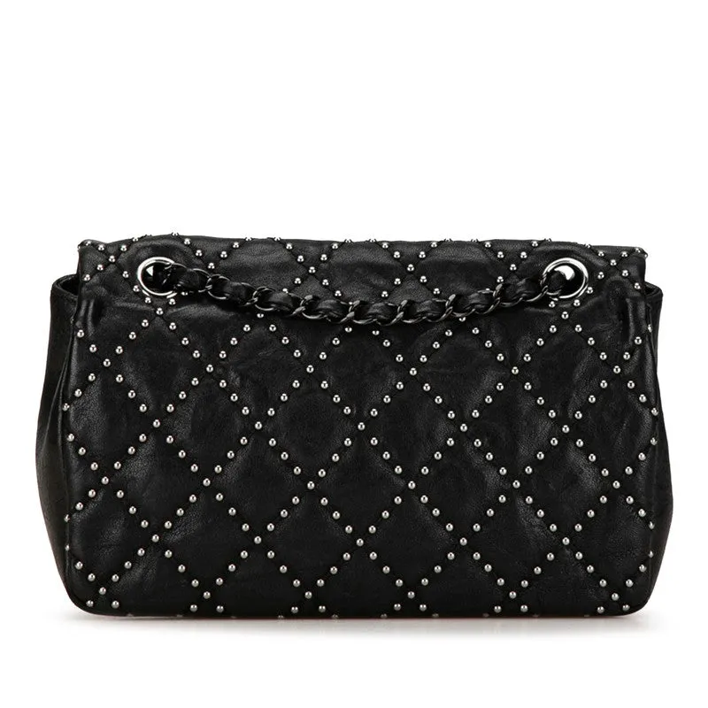 Chanel Medium Quilted Leather Studded Flap Bag Leather Shoulder Bag in Good condition