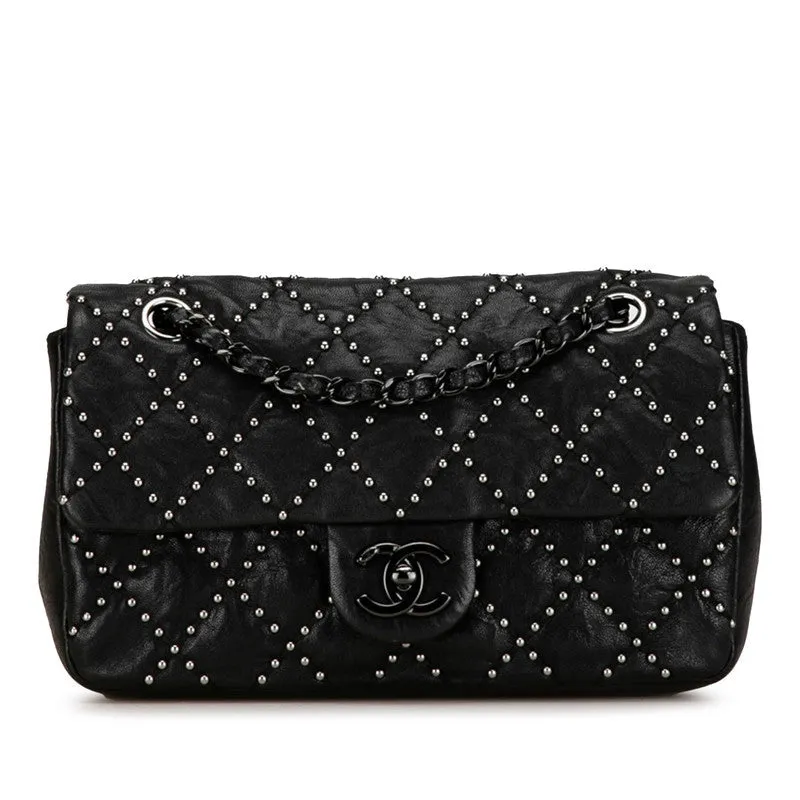 Chanel Medium Quilted Leather Studded Flap Bag Leather Shoulder Bag in Good condition