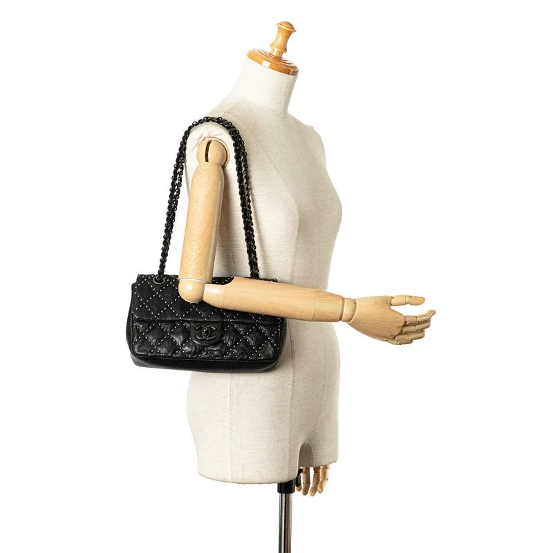 Chanel Medium Quilted Leather Studded Flap Bag Leather Shoulder Bag in Good condition