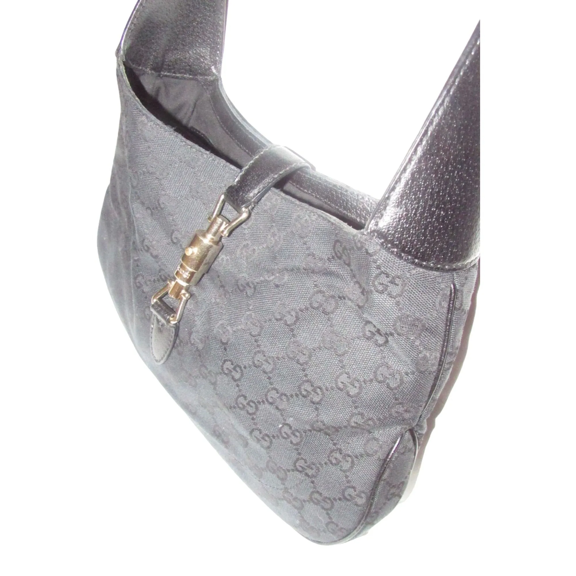 Gucci, large size, black Guccissima print & black leather, 1961 Jackie hobo style, shoulder bag with a gold piston closure