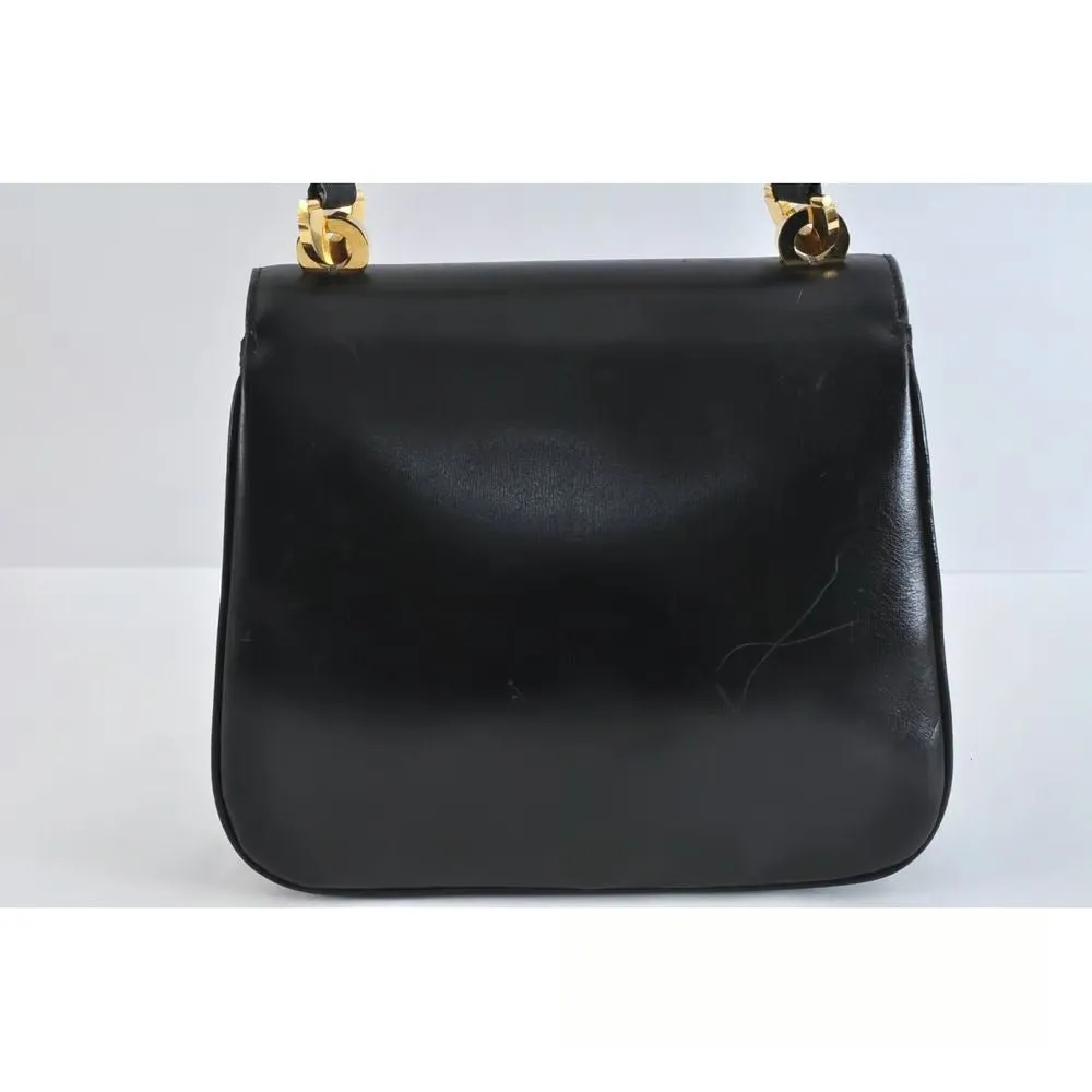 Unique 1960s Gucci mod, black leather, shoulder bag with a beautiful, blue, lapis lazuli accent on the clasp & bold gold hardware