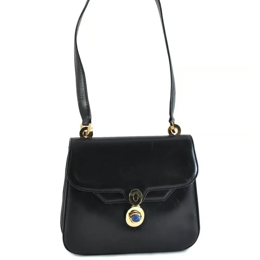 Unique 1960s Gucci mod, black leather, shoulder bag with a beautiful, blue, lapis lazuli accent on the clasp & bold gold hardware